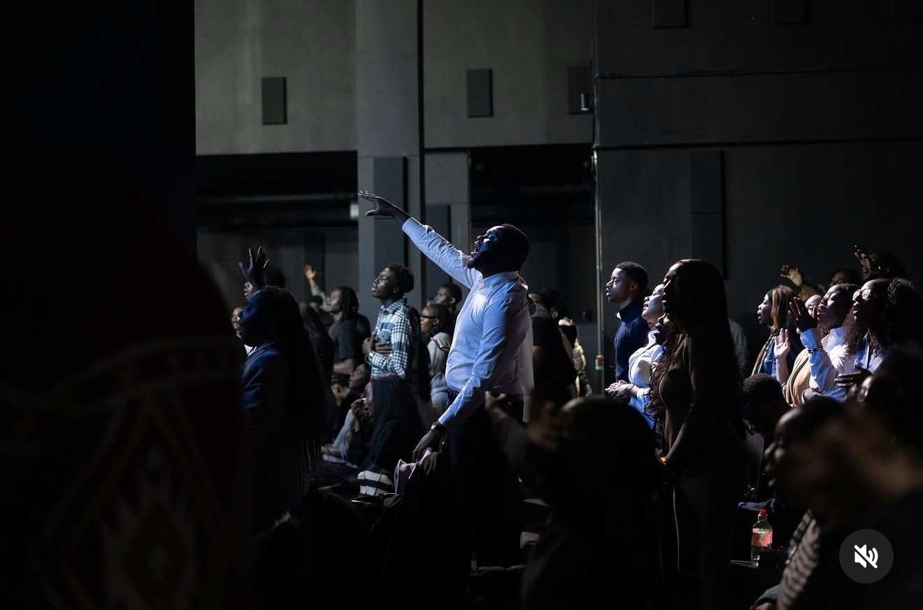 An arm raised in praise